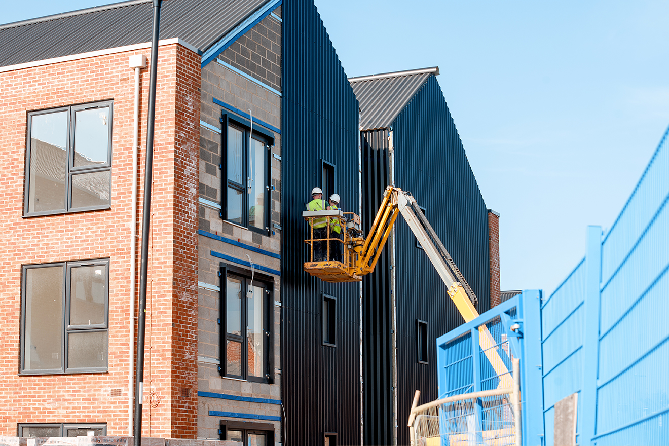 Forklift used on construction site, building new housing